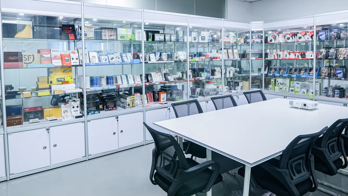 Packaging samples displayed around the company meeting table